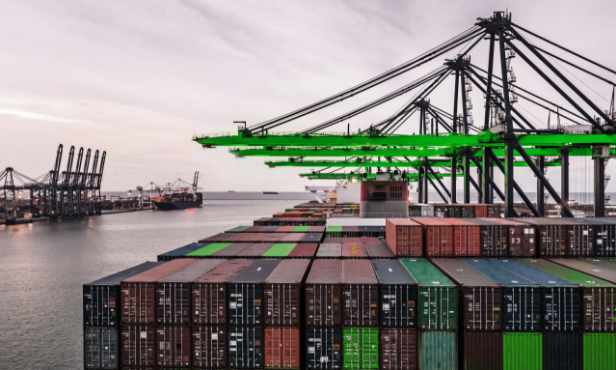 Fully loaded with containers, ship sailing at sea, showcasing ExpressHeroes' shipping capabilities